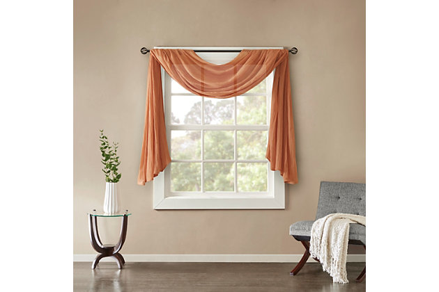 Soften the edges of your window, with our Madison Park Harper Solid Crushed Sheer Scarf. This light spice scarf features crushed detailing for beautiful texture, while the lightweight sheer fabric provides easy draping and an airy touch to your decor. Four tabs are also included to make the DIY assembly easy so you can drape the scarf to best fit your window. For a complete look, layer this scarf with coordinating panels or prints in our collection for a more custom appeal.Imported | Comes with 4 tabs for easy assembly | Coordinate with window panel for complete look | Diy and drape to best fit your window | Lightweight sheer crushed fabric for texture | Layer for custom look