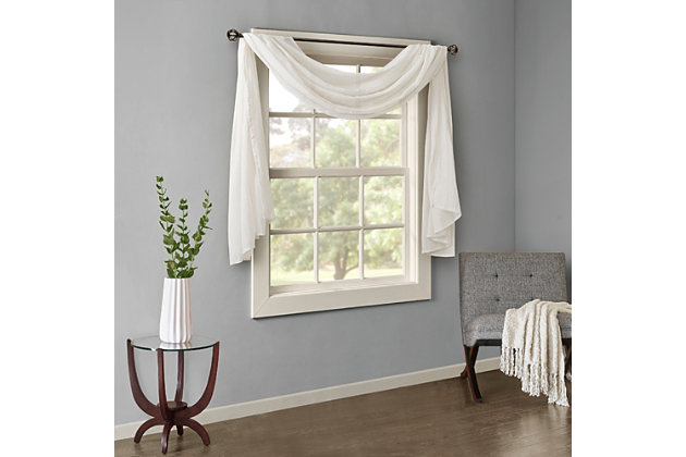 Soften the edges of your window, with our Madison Park Harper Solid Crushed Sheer Scarf. This crisp white scarf features crushed detailing for beautiful texture, while the lightweight sheer fabric provides easy draping and an airy touch to your decor. Four tabs are also included to make the DIY assembly easy so you can drape the scarf to best fit your window. For a complete look, layer this scarf with coordinating panels or prints in our collection for a more custom appeal.Imported | Comes with 4 tabs for easy assembly | Coordinate with window panel for complete look | Diy and drape to best fit your window | Lightweight sheer crushed fabric for texture | Layer for custom look