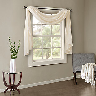 Soften the edges of your window, with our Madison Park Harper Solid Crushed Sheer Scarf. This rich cream scarf features crushed detailing for beautiful texture, while the lightweight sheer fabric provides easy draping and an airy touch to your decor. Four tabs are also included to make the DIY assembly easy so you can drape the scarf to best fit your window. For a complete look, layer this scarf with coordinating panels or prints in our collection for a more custom appeal.Imported | Comes with 4 tabs for easy assembly | Coordinate with window panel for complete look | Diy and drape to best fit your window | Lightweight sheer crushed fabric for texture | Layer for custom look