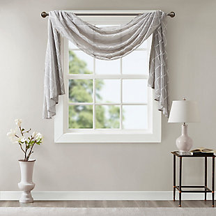 Madison Park’s Irina Diamond Sheer Window Scarf provides an alluring update to your home. An elegant diamond pattern is beautifully embroidered on a soft sheer fabric, adding grace and charm to your décor. The neutral colors and light fabric helps create a delicate look to soften any room. Perfect on it's own as a beautiful drape to frame any window, or complete the look with coordinating window panels, sold separately.Imported | All over diamond embroidery design | Lightweight sheer base fabric | Coordinate with window panel for complete look | Diy and drape to best fit your window | Layer for custom look
