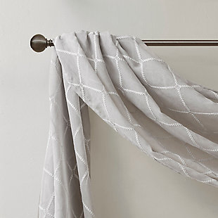Madison Park’s Irina Diamond Sheer Window Scarf provides an alluring update to your home. An elegant diamond pattern is beautifully embroidered on a soft sheer fabric, adding grace and charm to your décor. The neutral colors and light fabric helps create a delicate look to soften any room. Perfect on it's own as a beautiful drape to frame any window, or complete the look with coordinating window panels, sold separately.Imported | All over diamond embroidery design | Lightweight sheer base fabric | Coordinate with window panel for complete look | Diy and drape to best fit your window | Layer for custom look
