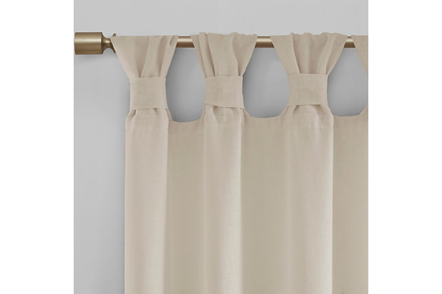 Simple and feminine in all the right ways, Madison Park Rosette Tab Top Solid Window Panel Embellished with Flower offers a gorgeous one-of-a-kind look to your home. This natural linen color panel features a tab top finish and beautiful removable floral pins that give your room a decorator’s touch. The lightweight faux linen semi-sheer fabric filters the perfect amount of light into your home,  while creating a soft airy feel - for the perfect shabby chic update to your decor. Window panel is machine washable for easy care, while removable floral pins are spot clean only. Fits up to a 2" diameter rod.Imported | Tab top curtains that can fit up to 2" diameter rod | Removable floral pins for decorators touch | Lightweight faux linen sheer base for natural look and feel | Shabby chic home decor | Available in 63, 84 or 95 inches in length curtain panel | Need to buy 2 panels for each window | Machine washable for easy care - remove all flowers before machine washing