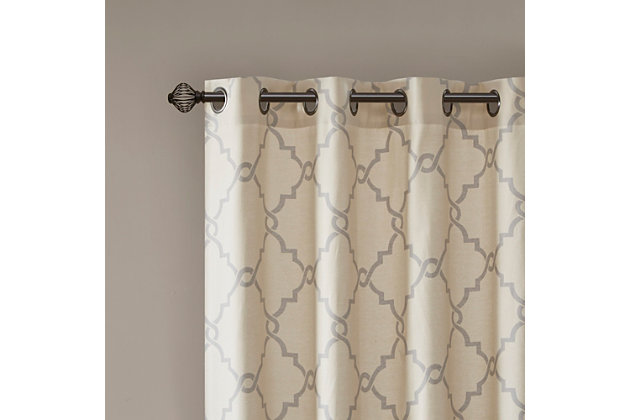 For a casual and stylish update, our Madison Park Saratoga Fret Print Window Curtain is the perfect addition to any decor. This window panel features a trendy soft grey fretwork on a light beige ground, creating a simple yet modern look. The cotton blend basket weave fabric softly filters the perfect amount of sunlight into your home, while providing texture for natural appeal. Silver grommet top detail makes this panel easy to hang, open, and close throughout the day. Fits up to a 1.25" diameter rod.Imported | Scroll geometric fretwork print design window curtain panel in grommet top | Print detailing on cotton blend basketweave fabric | Silver grommet top finish | Opaque curtain that offers privacy | Machine washable