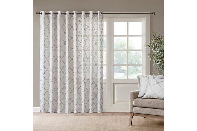 For a casual and stylish update, our Madison Park Saratoga Fret Print Patio Panel is the perfect addition to any decor. This patio panel features a trendy metallic silver fretwork on a soft ivory ground, creating a simple yet modern look. The cotton blend basket weave fabric softly filters the perfect amount of sunlight into your home, while providing texture for natural appeal. Silver grommet top detail makes this panel easy to hang, open, and close throughout the day. Fits up to a 1.25" diameter rod.Imported | Scroll geometric fretwork print design window curtain panel in grommet top | Curtain dimension 100x84, wide enough to cover your patio door | Metallic print detailing on cotton blend basketweave fabric | Silver grommet top finish | Opaque curtain that offers privacy | Machine washable