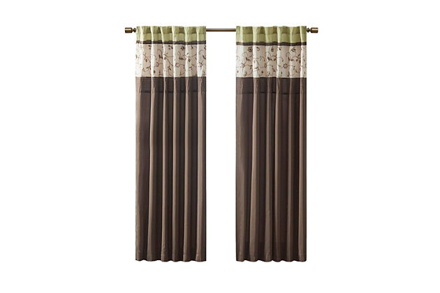 Add simple elegance to any room with the Madison Park Serene Embroidered Window Panel. This window curtain features delicate floral embroidery in soft green and natural hues, offering beautiful contrast for a sophisticated look. The pieced and pleated details provide extra dimension and charm to your home décor, while added lining helps filter the perfect amount of sunlight into your home. Simply hang with rod pocket or backs tabs for a tailored look. Fits up to a 1.25" diameter rod.Imported | Floral embroidery design | Pleated detailing | Added lining to help filter light and provide some room darkening | Rod pocket and back tabs top finish