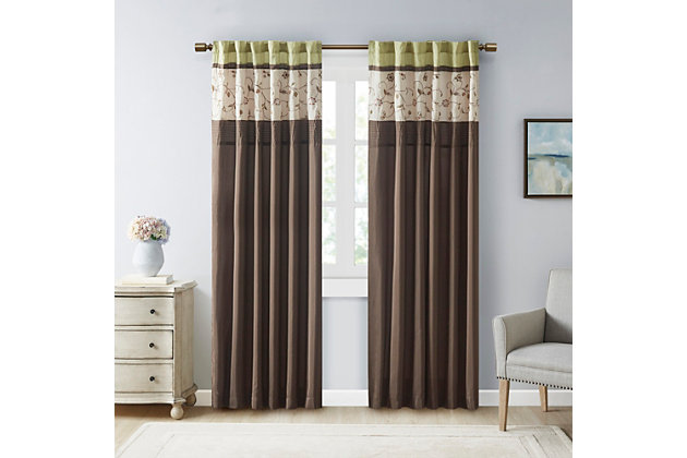 Add simple elegance to any room with the Madison Park Serene Embroidered Window Panel. This window curtain features delicate floral embroidery in soft green and natural hues, offering beautiful contrast for a sophisticated look. The pieced and pleated details provide extra dimension and charm to your home décor, while added lining helps filter the perfect amount of sunlight into your home. Simply hang with rod pocket or backs tabs for a tailored look. Fits up to a 1.25" diameter rod.Imported | Floral embroidery design | Pleated detailing | Added lining to help filter light and provide some room darkening | Rod pocket and back tabs top finish