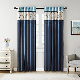 The Serene window panel adds a simple elegant touch to any room. The deep navy color combined with soft ivory and chocolate brown creates the perfect classic look. The panel features delicate floral embroidery and pleated details that add dimension. Added lining helps to filter light and provide some room darkening features. Panel is made with 3" rod pocket as well as back tabs; fits up to 1.25" diameter rod.Imported | Embroidery | Pieced and pleated detailing | Added lining | Rod pocket and back tabs