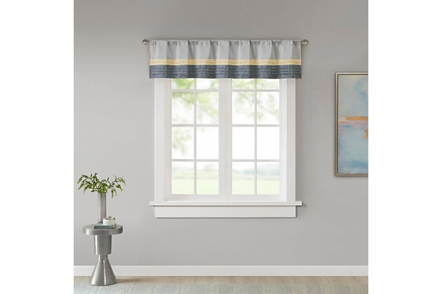Amherst's modern color block design is a simple way to add style to any room. This window valance features color block stripes in hues grey and yellow, combined with pintuck detailing for beautiful texture and dimension. Added lining helps to filter the perfect amount of light and creates a fuller look. Hang using the rod pocket top. Fits up to 1.25" diameter rod.Imported | Pieced and pintucking detail | Light sheen fabric | Additional lining