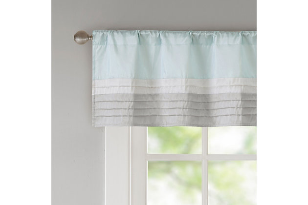 Amherst's modern color block design is a simple way to add style to any room. This window valance features color block stripes in soft hues of aqua, grey, and ivory combined with pintuck detailing for beautiful texture and dimension. Added lining helps to filter the perfect amount of light and creates a fuller look. Hang using the rod pocket top. Fits up to 1.25" diameter rod.Imported | Pieced and pintucking detail | Light sheen fabric | Additional lining