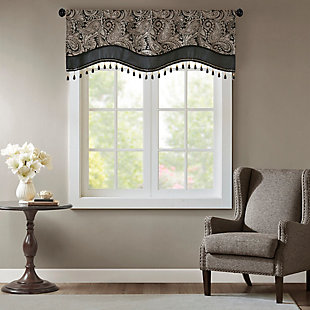For a unique and luxuriously classic style, our Madison Park Aubrey Beaded Valance is the perfect extra touch to your decor. 
The alluring jacquard weave is inspired from an updated paisley motif and is woven in beautiful hues of black, gold, and a hint of silver for a shimmering accent. 
The window valance features solid faux silk piecing and flat piping details, while delicately finished with a scalloped bottom design and intricate gold bead trim, creating an intriguing elegant look. This window panel is also OEKO-TEX certified, meaning it does not contain any harmful substances or chemicals, ensuring quality comfort and wellness. 
Simply hang on rod pocket; fits up to a 1.25 diameter rod.Imported | Paisley jacquard design valance | Piping and contrast solid border detailing | Scalloped bottom design with bead trimming | Oeko-tex certified, includes no harmful substances or chemicals (#sh025 157066) | Fits up to 1.25 inches rod diameter | Machine washable
