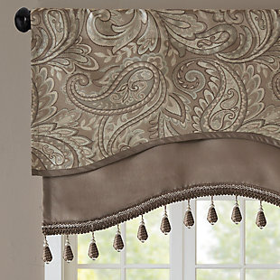 For a unique and luxuriously classic style, our Madison Park Aubrey Beaded Valance is the perfect extra touch to your decor. 
The alluring jacquard weave is inspired from an updated paisley motif and is woven in beautiful hues of blue, taupe, and a hint of silver for a shimmering accent. 
The window valance features solid faux silk piecing and flat piping details, while delicately finished with a scalloped bottom design and intricate gold bead trim, creating an intriguing elegant look. This window panel is also OEKO-TEX certified, meaning it does not contain any harmful substances or chemicals, ensuring quality comfort and wellness. 
Simply hang on rod pocket; fits up to a 1.25 diameter rod.Imported | Paisley jacquard design valance | Piping and contrast solid border detailing | Scalloped bottom design with bead trimming | Oeko-tex certified, includes no harmful substances or chemicals (#sh025 157066) | Fits up to 1.25 inches rod diameter | Machine washable