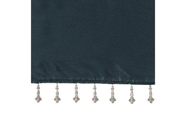 Give your home a decorator’s touch with the Madison Park Emilia Window Valance. Made from a faux silk fabric, this elegant window valance features a DIY twist tab top finish that creates rich deep folds, combined with a beautiful bead trim for an alluring charm. Added lining offers more privacy and a fuller appearance, while the luxurious sheen and jewel teal tone provides a touch of sophistication to your decor. Easy to hang, this tab top valance updates any decor into subtle glamour. Hanging instructions are included. Fits up to a 2" diameter rod.Imported | Transitional valance in solid faux silk with beads | Coordinating to the window curtain in various colors and sizes | Diy twisted tab top finish that fits up to 2 inches rod diameter | Lined for privacy and drapability | Need 2 valances for each window | Machine washable
