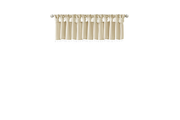 Give your home a decorator’s touch with the Madison Park Emilia Window Valance. Made from a faux silk fabric, this elegant window valance features a DIY twist tab top finish that creates rich deep folds, combined with a beautiful bead trim for an alluring charm. Added lining offers more privacy and a fuller appearance, while the luxurious sheen and rich champagne tone provides a touch of sophistication to your decor. Easy to hang, this tab top valance updates any decor into subtle glamour. Hanging instructions are included. Fits up to a 2" diameter rod.Imported | Transitional valance in solid faux silk with beads | Coordinating to the window curtain in various colors and sizes | Diy twisted tab top finish that fits up to 2 inches rod diameter | Lined for privacy and drapability | Need 2 valances for each window | Machine washable