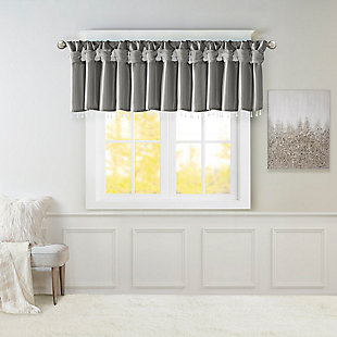 Give your home a decorator’s touch with the Madison Park Emilia Window Valance. Made from a faux silk fabric, this elegant window valance features a DIY twist tab top finish that creates rich deep folds, combined with a beautiful bead trim for an alluring charm. Added lining offers more privacy and a fuller appearance, while the luxurious sheen and rich charcoal tone provides a touch of sophistication to your decor. Easy to hang, this tab top valance updates any decor into subtle glamour. Hanging instructions are included. Fits up to a 2" diameter rod.Imported | Transitional valance in solid faux silk with beads | Coordinating to the window curtain in various colors and sizes | Diy twisted tab top finish that fits up to 2 inches rod diameter | Lined for privacy and drapability | Need 2 valances for each window | Machine washable