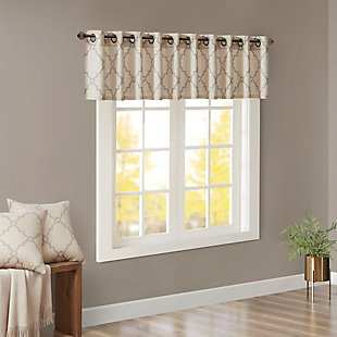 For a casual and stylish update, our Madison Park Saratoga Fret Print Window Valance is the perfect addition to any decor. This valance features a trendy soft grey fretwork on a light beige ground, creating a simple yet modern look. The cotton blend basket weave fabric softly filters the perfect amount of sunlight into your home, while providing texture for natural appeal. Silver grommet top detail makes this panel easy to hang, open, and close throughout the day. Fits up to a 1.25" diameter rod.Imported | Scroll geometric fretwork print design valance for window decor | Metallic print detailing on basketweave fabric | Valence dimension 50x18 inches | Silver grommet top finish fits up to 1.25 inches rod in diameter | Machine washable