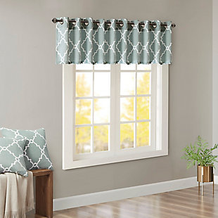 For a casual and stylish update, our Madison Park Saratoga Fret Print Window Valance is the perfect addition to any decor. This valance features a trendy light beige fretwork on a seafoam ground, creating a simple yet modern look. The cotton blend basket weave fabric softly filters the perfect amount of sunlight into your home, while providing texture for natural appeal. Silver grommet top detail makes this panel easy to hang, open, and close throughout the day. Fits up to a 1.25" diameter rod.Imported | Scroll geometric fretwork print design valance for window decor | Metallic print detailing on basketweave fabric | Valence dimension 50x18 inches | Silver grommet top finish fits up to 1.25 inches rod in diameter | Machine washable