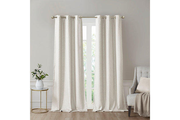 Elevate your decor with the modern style and function of our SunSmart Como Tonal Printed Faux Silk Total Blackout Panel Pair. This blackout curtain pair flaunts a tonal ivory hue on a faux silk textured fabric that creates a beautiful and rich modern look. Also achieving the OEKO-TEX certification, these curtains do not contain any harmful substances or chemicals ensuring quality comfort and wellness. Each panel features a heavyweight light grey foamback on the reverse making it 100% total blackout, blocking out all outside light, noise, and intrusion for the highest level of privacy. Using thermal technology, the total blackout curtain also helps provide maximum energy savings by keeping your room the perfect temperature throughout the year. Easily hang, open, and close panels throughout the day with the silver grommet top finish; this total blackout window panel pair is perfect for use in bedrooms, media rooms, or any private space providing a pitch black ambiance lighting level when curtains are fully closed.Imported | Modern contemporary tonal printed faux silk textured base curtain panel pair | Silver grommet top that will fit up to 1.25 inches rod in diameter | Added light gray heavyweight 2pass foamback lining for 100% total blackout | 100% total blackout provides maximum barrier to block out all exterior light and noise intrusion | Energy efficient with thermal technology for maximum energy savings and high level of privacy | Oeko-tex certified, includes no harmful substances or chemicals (#20.hcn.14341) | Provides a pitch black ambiance for lighting level when curtains are completely closed, making it perfect for any bedrooms, media rooms, any private spaces | Panel pair is available in 63, 84 or 95 inches length | Machine washable for easy care