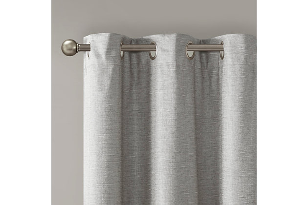 Elevate your decor with the modern style and function of our SunSmart Como Tonal Printed Faux Silk Total Blackout Panel Pair. This blackout curtain pair flaunts a tonal grey hue on a faux silk textured fabric that creates a beautiful and rich modern look. Also achieving the OEKO-TEX certification, these curtains do not contain any harmful substances or chemicals ensuring quality comfort and wellness. Each panel features a heavyweight light grey foamback on the reverse making it 100% total blackout, blocking out all outside light, noise, and intrusion for the highest level of privacy. Using thermal technology, the total blackout curtain also helps provide maximum energy savings by keeping your room the perfect temperature throughout the year. Easily hang, open, and close panels throughout the day with the silver grommet top finish; this total blackout window panel pair is perfect for use in bedrooms, media rooms, or any private space providing a pitch black ambiance lighting level when curtains are fully closed.Imported | Modern contemporary tonal printed faux silk textured base curtain panel pair | Silver grommet top that will fit up to 1.25 inches rod in diameter | Added light gray heavyweight 2pass foamback lining for 100% total blackout | 100% total blackout provides maximum barrier to block out all exterior light and noise intrusion | Energy efficient with thermal technology for maximum energy savings and high level of privacy | Oeko-tex certified, includes no harmful substances or chemicals (#20.hcn.14341) | Provides a pitch black ambiance for lighting level when curtains are completely closed, making it perfect for any bedrooms, media rooms, any private spaces | Panel pair is available in 63, 84 or 95 inches length | Machine washable for easy care