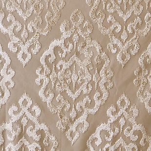 Give your home the lavish style and energy efficiency it deserves with our SunSmart Mirage Knitted Jacquard Total Blackout Panel. This elegant window panel flaunts a knitted jacquard damask design in a rich champagne hue, creating a luxurious sheen and texture. The heavyweight fabric features a foam-back and bonding finish that blocks out all sunlight and provides a maximum protective barrier against noise intrusion. With 100% total blackout properties, this window panel offers a maximum level of privacy and energy savings, which makes it perfect for bedrooms, media rooms, or any private spaces. A gunmetal grommet top detail completes the look, while also making it easy to hang, open, and close the window panel throughout the day. Fits up to a 1.25” diameter rod. Lighting level: Pitch Black Ambiance.Imported | Total blackout grommet top curtain panel in knitted jacquard damask design | Heavy weight fabric in foamback bonding finish on the reverse side | Block out all sunlight and exterior light | Silver grommet top that fits up to 1.25 inches rod in diameter | Maximum level of privacy, energy saving and block noise intrusion | Great for bedroom, media room or any private space | Need to purchase 2 curtain panels for each window | Machine washable