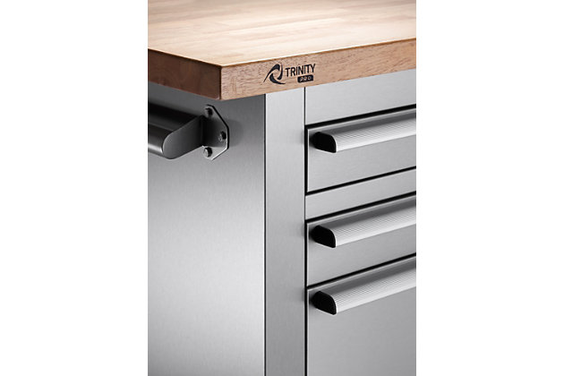 This adjustable height rolling workbench is built with a solid wood top that can be raised and lowered with the simple turn of a crank. The adjustable height provides ergonomic comfort to help reduce strain and discomfort while standing or sitting for long periods. The heavy-duty fingerprint-resistant stainless steel construction provides the strength and durability to handle the toughest jobs. The rubberwood top is designed with a overhang on both sides to mount a vise. The construction of this workbench is professional-grade and designed to meet the needs of experts who value high quality and remarkable craftsmanship.Made of stainless steel, rubberwood and aluminum | Fingerprint resistant stainless steel finish | Butcher block top; adjustable height up to 12 inches  | 9 smooth-gliding drawers | Pre-cut drawer liners | Single cabinet with adjustable shelf | Center locking system | Total weight capacity 2,220 pounds on wheels (evenly distributed) | Casters for easy mobility (2 locking; 2 non-locking) | Aluminum drawer pulls with chrome-tone finish | Stainless steel side handles | Minor assembly required