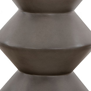 The Lizzie accent stool end table is a wonderfully unique piece that communicates its individuality with its look. The sophisticated texture and bold geometric form create a grand statement in any indoor or outdoor space. The concrete is lightweight, making it easy to move, but is still able to hold a substantial amount of weight. Perfect as an end table in your living space, home office or patio and diverse enough to be used for an impromptu seating option as the seat height is comparable to the average dining chair seat height.Made of concrete | Can be used for display space or extra seating | Simple to clean and easy to maintain; wipe clean