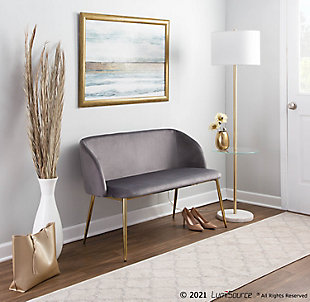 Enrich your bedroom, living room or entryway with the timeless style of the Fran Bench by Lumisource. Featuring a velvet upholstered bucket seat and sleek goldtone metal legs, it's the perfect addition to your home.Made with velvet fabric, metal, engineered wood and foam | Velvet upholstery | Padded seat | Goldtone metal legs | Backrest for added comfort | Seats 2 comfortably | Glam styling | Assembly required | Imported