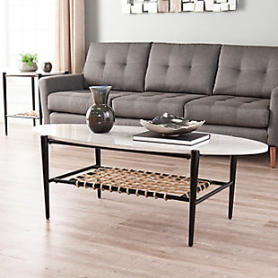 Rope in boho style. Cast an eclectic profile with this elongated oval cocktail table. Black metal and white faux marble, wrapped in natural hemp rope, bring a free-spirited look to your decor. Weave accent items into your space with your favorite reads or games on the hemp shelf, and your wine and cheese spread on the faux stone tabletop. Entertain intertwined style with this eclectic coffee table serving up your living room look.Made of engineered wood and metal | Woven hemp shelf | Top with faux marble paper veneer | Frame with black powdercoat finish | High contrast color scheme | Assembly required