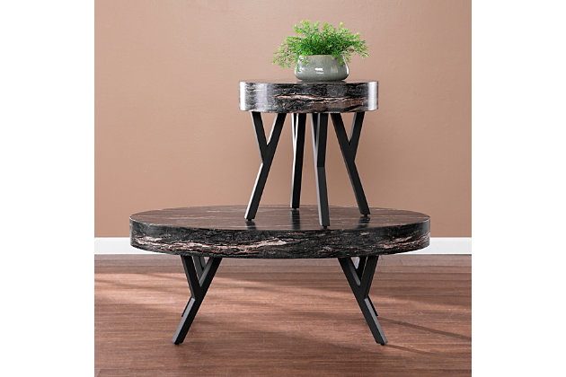 Modernize your living room look with this faux marble end table. A round tabletop holds framed photos or your cup of tea, while sleek metal legs add a touch of industrial flair. Designed for small spaces, this round accent table fits neatly alongside your living  room sofa or into your entryway as a modern plant stand. Create a sophisticated look in your studio apartment or open concept living space when you add this faux marble side table.Made of engineered wood and metal | Top with faux marble pattern | Unique mixed-material construction | Small space friendly design | Assembly required