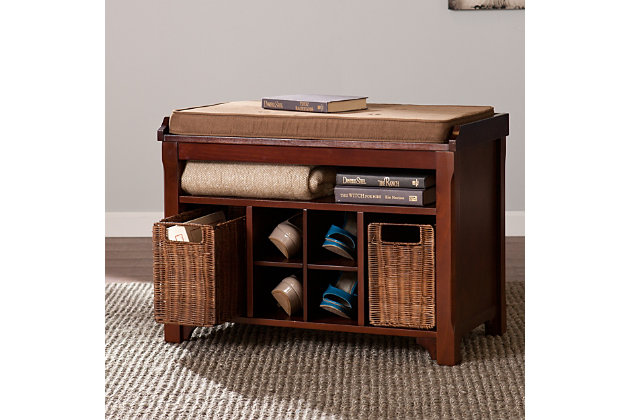 Conquer the challenge of small space seating and storage with this multizonal, multitasking storage bench. Barely there footprint fits most tight spaces and eclectic harmony of espresso, caramel, and carob complements everything without blending in. Microfiber cushion sits comfy while shelving, rattan baskets, and compartments tidy everything from shoes and socks to dog walking gear. Relax, and take a load off with this storage bench in an entryway, dressing area, or mudroom.Small footprint bench tackles storage and seating | 4 shoe storage compartments, 2 removable rattan baskets, and 1 fixed shelf | Removable cushion