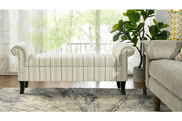 A bench like none other. The Kathy Collection roll-arm bench by Jennifer Taylor Home features a unique stitched and embroidered chenille fabric that is guaranteed to attract compliments. Adorned with a beautiful 3-ply twisted cord rope trim along the outline and inset of the arms, the Kathy bench is the perfect way to upgrade the look of any room in your home. An ideal choice for the entryway, it is also at home in the bedroom, or living room. This bench brings class and lounging comfort to any room. Wrapped in high-quality fabric, the solid wood frame is made from kiln-dried birch which provides exceptional support and stability.  Jennifer Taylor Home offers a unique versatility in design and makes use of a variety of trend inspired color palettes and textures. Our products bring new life to the classic American home.Bench-made home furnishing products carefully hand built by experienced craftsmen and women | A sturdy frame of kiln-dried solid hardwood and 11-layer plywood for strength and support that will last | Upholstered in high-quality woven fabric atop premium high-density flame-retardant foam for a luxurious medium firm feel | Hand-applied iron nailhead accents with zinc finish | High quality material selection provide  durability with a lush look, wide variety of colors are cozy and inviting.