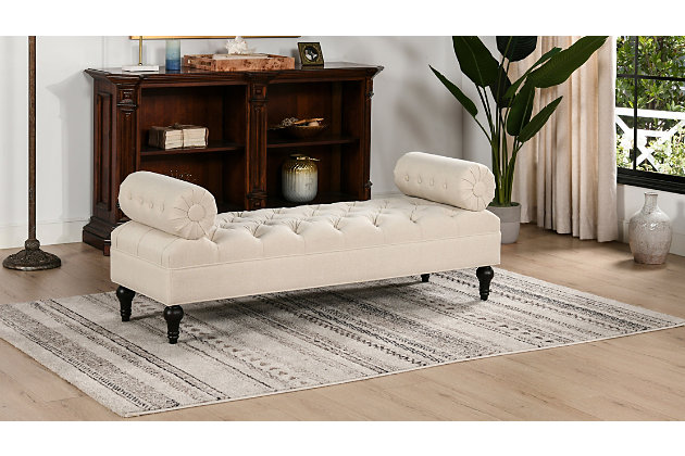 When glam meets traditional. The Lewis Collection by Jennifer Taylor Home adds the perfect balance between glam and traditional look to give a fresh new look to any living space. Crafted beautifully with solid kiln dried Birchwood, upholstered with high grade fabrics, and accented with hand tufting along the seat and matching removable bolster pillows, this bench brings class and lounging comfort to any room in the home, whether it’s used as additional seating for guests or extra space to spruce up your home decor.Bench-made home furnishing products carefully hand built by experienced craftsmen and women | A sturdy frame of kiln-dried solid hardwood and 11-layer plywood for strength and support that will last | Upholstered in high-quality woven fabric atop premium high-density flame-retardant foam for a luxurious medium firm feel | Low seat height of 15 inches is great for placing at the end of a bed or below a low window | Two bolster arms give a lovely vintage style | Hand gathered tufting detail all over the seat and the bolster arms