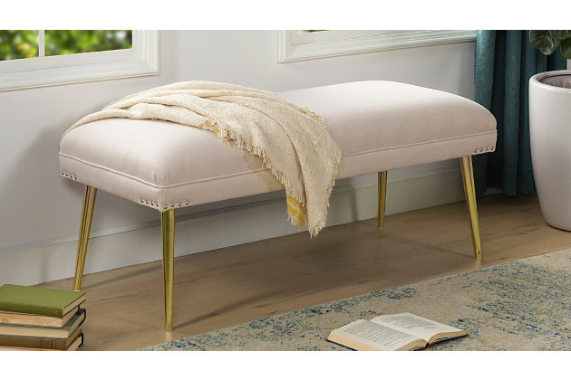 The Pamela Collection by Jennifer Taylor Home is the perfect addition to any living space looking to add a bit of a modern contemporary flair. High quality fabric wraps a solid wood frame made from 11-layer plywood and kiln dried birch which provides exceptional support and stability. Carefully handmade with hand-applied nailhead accents on each corner and complemented by tapered goldtone metal legs polished to a mirror finish, this bench brings class and lounging comfort to any room in the home. Whether it’s used as additional seating, or just to spruce up your home decor, you're sure to appreciate the subtle details that makes up this beautiful piece.Bench-made home furnishing products carefully hand built by experienced craftsmen and women | A sturdy frame of kiln-dried solid hardwood and 11-layer plywood for strength and support that will last | Upholstered in high-quality woven fabric atop premium high-density flame-retardant foam for a luxurious medium firm feel | Hand-applied iron nailhead accents with zinc finish | High quality material selection provide  durability with a lush look, wide variety of colors are cozy and inviting.