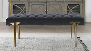 The Aria Accent Bench by Jennifer Taylor Home is a glamorous statement perfect wherever you need additional seating. The performance velvet upholstery is durable and soft, great for homes with kids and pets, and is complemented by the satin goldtone legs. Use this bench as a dining banquette to complete your dining set, or as a cocktail ottoman in  your living room, or in your bedroom at the end of your bed.Handmade by master furniture craftsmen for the highest level of quality | Sturdy frame of kiln-dried solid birchwood and layered plywood provides excellent support and stability | Upholstered in performance velvet atop a high-density foam cushion for a medium firm feel | Seat is hand-tufted for a crafted, detailed look | Add an element of glam with the satin gold legs | Great in the living room, entryway, or bedroom