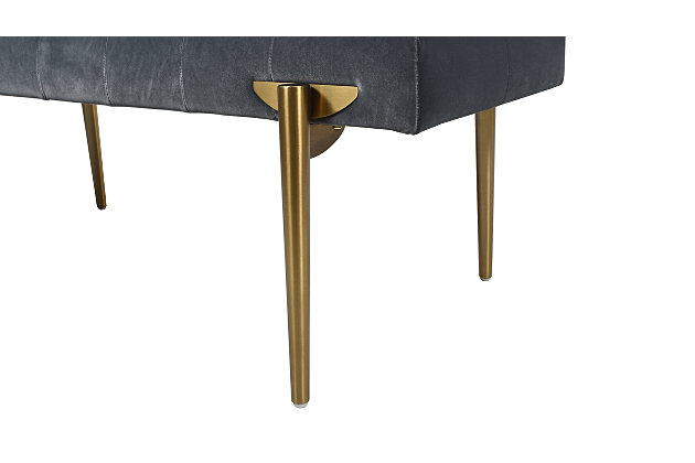The Aria Accent Bench by Jennifer Taylor Home is a glamorous statement perfect wherever you need additional seating. The performance velvet upholstery is durable and soft, great for homes with kids and pets, and is complemented by the satin goldtone legs. Use this bench as a dining banquette to complete your dining set, or as a cocktail ottoman in your living room, or in your bedroom at the end of your bed.Handmade by master furniture craftsmen for the highest level of quality | Sturdy frame of kiln-dried solid birchwood and layered plywood provides excellent support and stability | Upholstered in performance velvet atop a high-density foam cushion for a firm feel | Seat is hand-tufted for a crafted, detailed look | Add an element of glam with the satin gold legs | Great in the living room, entryway, or bedroom