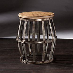 Barrel your way to rustically chic design with this ruggedly cool, industrial accent table. Hollow, bow-legged design allows for peek-a-boo storage of everyday clutter and the drum-style tabletop happily displays antique books, oversized coffee mugs, or a sleek lamp. Forging of weathered fir, antique silver, and riveted trim tops off constructed élan, furnishing this table, and your flat, with an instant style revolution.Rustic, industrial style | Wine barrel shape evokes modern Western feel | Galvanized metal, distressed wood create trendy juxtaposition | Hollow figure for storage or creative displays | Studded accents