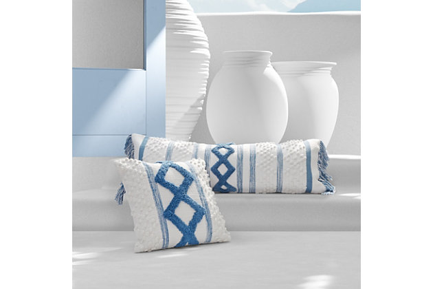 Crafted from exceptionally fine 100% Cotton yarns, the White Sand Lumbar Throw Pillow adds relaxed versatility and effortless layering to your decor. A Mykonos inspired color combination of optic white and blue hues beautifully adorn the multi-textured handloom construction. This lovely accent is finished with a fringed trim, adds a refreshed dimension to your space, and coordinates beautifully with the Serenity and Blue Bay Collections.Cotton features unique insulation properties that keeps you warm in the Winter, and breathability to keep you cool in the Summer | Yarns are of the highest quality, combed, long staples, providing long lasting comfort and durability | White Sand linens are crafted with a high level of complexity and detail, and embrace distinct Portuguese weaving looms that are a mastery of many generations | White Sand products are covered by OEKOTEX STANDARD 100 CLASS I, guaranteeing chemical-free environmentally friendly materials and packaging | 100% Cotton | Imported