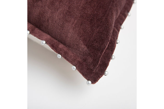 This pillow is 100% cotton velvet, featuring a ¾ inch self-flange. Silver pearlized beads are hand stitched to the edge of the flange. Every third bead is hand knotted to prevent the whole strand from demise should one bead break away. The back is natural burlap with a zippered closure for ease of fill and cleaning. This pillow is fabulous as a stand-alone design element and is also a great foundational layering element.Cotton velvet | hand applied silver beaded trim | Three quarter inch flange | beading is hand knotted to prevent total bead disaster should one bead be compromised | solid coordinating back with hidden zipper closure | 100% Cotton