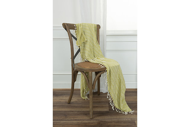 This light weight hand crafted throw is the perfect weight to cast off a seasonal night’s chill. Two color chevron pattern, playfully played, in fashion colors gives a living space a quick dash of color in a functional, fun piece. Self warp hand tied tassel fringe and hemmed selvages give this little treasure the perfect pop of pizzaz.hand loomed cotton | artisinally hand crafted | warp hand tied tassel fringe | light texture | light weight | 100% Cotton