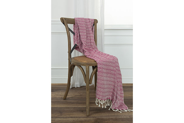 This light weight hand crafted throw is the perfect weight to cast off a seasonal night’s chill. Two color chevron pattern, playfully played, in fashion colors gives a living space a quick dash of color in a functional, fun piece. Self warp hand tied tassel fringe and hemmed selvages give this little treasure the perfect pop of pizzaz.hand loomed cotton | artisinally hand crafted | warp hand tied tassel fringe | very soft | light weight | 100% Cotton