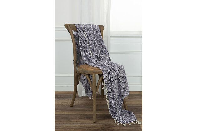This light weight hand crafted throw is the perfect weight to cast off a seasonal night’s chill. Two color chevron pattern, playfully played, in fashion colors gives a living space a quick dash of color in a functional, fun piece. Self warp hand tied tassel fringe and hemmed selvages give this little treasure the perfect pop of pizzaz.hand loomed cotton | artisinally hand crafted | warp hand tied tassel fringe | very soft | light weight | 90% Cotton/10% Acrylic