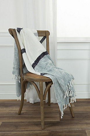 This light weight throw is crafted by changing the weft yarns in weaving to colored yarns of an already lightly textured cotton slubbed fabric construction. Hand stitchery accents compliment the coloration and lend an embellishing texture. Selvage edges are hemmed. Self warp cotton yarns are twisted and tied creating a beautifully hand crafted tasseled fringe.hand stitched embellishment | nubby cotton color blocked with heathered weave | warp twisted and knotted tassel fringe | light texture | light weight | 90% Cotton/10% Acrylic