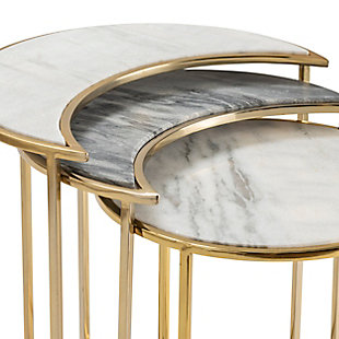 Style and function combine to create this set of three Astronomy Nesting Tables by Crestview Collection. Featuring two crescent-shaped tables and one round table, the space-saving design is perfect for contemporary areas. With a circular base crafted from iron in a goldtone finish, each glam table features an updated silhouette that supports a sophisticated marble top. These multicolored, versatile end tables can be nested or used separately to accommodate all your needs.Hand-carved from mango wood | Brown finish | 1 removable lower shelf | Shelf weight capacity: 30 lbs. | Total weight capacity: 50 lbs. | Inside length and width: 18"; inside height: 20" | Leg height from ground: 4" | Teflon protective glides | Wipe clean with a dry cloth | Assembly required | Indoor use only