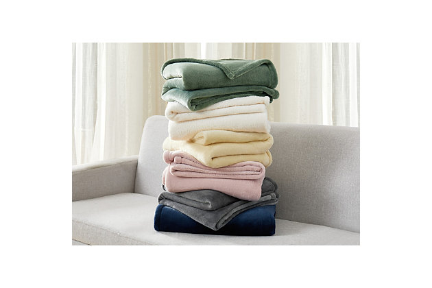 Stay snug and cozy all year round with Cannon's Solid Plush blankets. Made with 280 grams per square meter of the finest microfiber fabric, these blankets are guaranteed to be the new favorite item in your home. The Solid Plush Blankets are also offered in a variety of colors to help compliment your bedroom, living room, or any area of your home where comfort is required.Soft and cozy | 280 GSM plush fabric | Machine washable | 100% Polyester | Imported