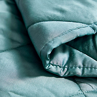 Indulge in the tranquility of the Breathable Bamboo Machine Washable 15 lb. Weighted Throw Blanket. This blanket features patent pending, innovative and machine washable/dryable technology. The luxurious blanket applies a calming, deep pressure with evenly distributed weight throughout. Naturally reducing stress while improving comfort and relaxation, this weighted throw blanket has you covered.Fabricated with 100% rayon made from natural bamboo | Green | Washable patent pending protective technology safely protects beads to ensure no leakage during wash and dry cycle | Made using eco-friendly sustainable fabric | Soft to touch, breathable design | Hypoallergenic, suitable for those with allergies | Box quilting to ensure evenly distributed weight throughout the blanket | Premium micro glass bead fill with 4 layers of lining to provide endless comfort | Weighted blankets provide deep pressure stimulation which reduces stress while promoting comfort and relaxation | Care: wash before use; machine wash cold non-chlorine bleach; tumble dry low heat