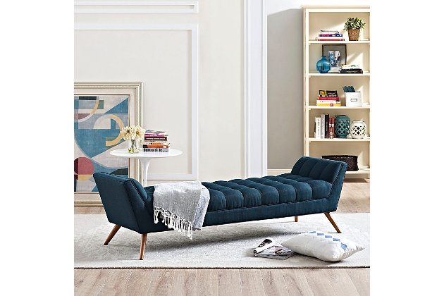 Embrace leisure time with the artfully designed Response Collection. Exquisitely crafted with a tufted seat and back, gently sloping arms and adorable design, Response comes well-loved for all the right reasons. Dense foam padding ensures comfort, while the well-orchestrated style will energize your space. Tapered wood legs with non-marketing foot caps finish off this piece of distinction and estimable appeal.Polyester upholstery | Foam padding | Walnut finished beech wood legs | Plastic foot glides | Assembly required