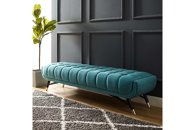 Embolden your living room decor with Adept bench. Featuring a blend of chic, contemporary and mid-century modern design, Adept's broad profile, generous tufting, stain-resistant performance velvet polyester upholstery and subtle metal accents imbue rich detail and chic sophistication. Kick back and enjoy the plush comfort of the Adept bench while reading your favorite book or lounging with friends and family.Performance velvet polyester upholstery | Dense foam padding | Splayed black birchwood frame | Goldtone metal foot end caps | Assembly required
