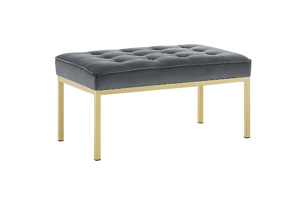 Revolutionize your living room furniture with the iconic Loft bench. Adding visual depth to your living room or lounge space, Loft features soft performance velvet upholstery accented in elegant button tufting. This modern living room accent bench comes in a captivating linear design with an external tubular stainless steel frame.Stain-resistant performance velvet | Dense foam padded cushion | Goldtone stainless steel legs | Linear biscuit button tufting | Non-marking foot caps
