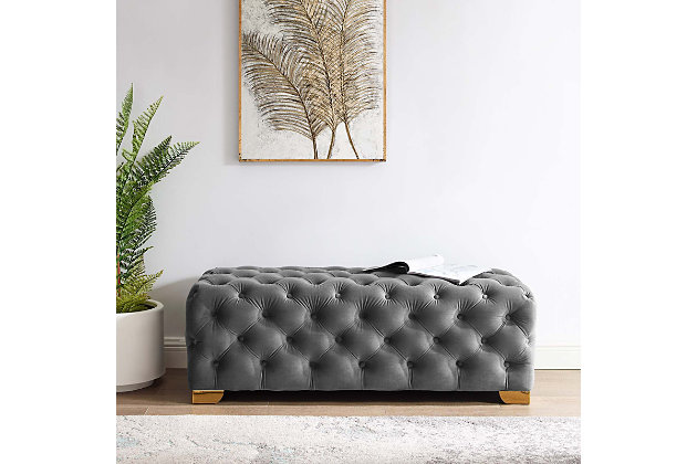 Refresh your entryway or living room decor with the Sensible bench. Deep button tufting covers the full expanse of Sensible’s soft, stain-resistant performance velvet upholstery. Generous dense foam padding provides a luxurious seating experience, while four goldtone stainless steel legs with non-marking foot caps provide reliable support.Performance velvet polyester upholstery | Durable stain-resistant fabric | Elegant deep button tufting | Goldtone stainless steel legs | Dense foam padding | Non-marking foot caps