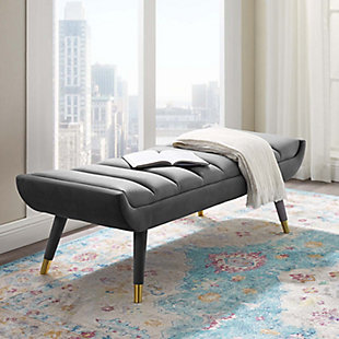 Subtle flair renews your living room decor with Guess. Channel tufting adds visual depth while Guess's gently curving ends add uplifting stability with vintage artisan accents. Guess is the transformative accent bench that will update your foyer, entryway, bedroom, living room, home office, or lounge area with sophistication and chic style. Soft, stain-resistant performance velvet upholstery covers the dense foam padding for added seating luxury. Guess is comprised of a solidly constructed rubberwood frame resting on four tapered birch legs covered in matching velvet upholstery with gold metal foot sleeves for that perfect artisan touch. Accent bench weight capacity: 600 lbs.Vintage Glamour Accent Bench | Performance Velvet Polyester Upholstery | Durable Stain-Resistant Fabric | Splayed Birch Wood Legs | Gold Metal Leg Sleeves | Dense Foam Padding | Assembly Required