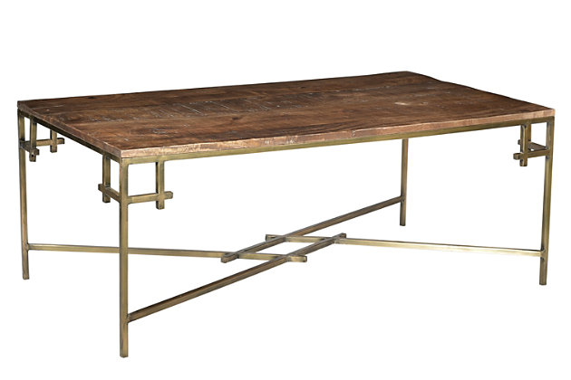 The Crestview Collection Bengal Manor Iron Corner Cocktail Table has a modern, transitional style that makes this rectangular table the perfect centerpiece for your living room. An iron base with an antiqued goldtone finish holds up a solid mango wood tabletop, while the base has four legs connected by a square in the center. Each corner where the base and table intersect features a square decoration.Mango wood tabletop  | Hand-rubbed, medium-brown finish  | Iron base and legs with antiqued goldtone finish  | Leg height: 17"  | Wipe clean with a dry cloth